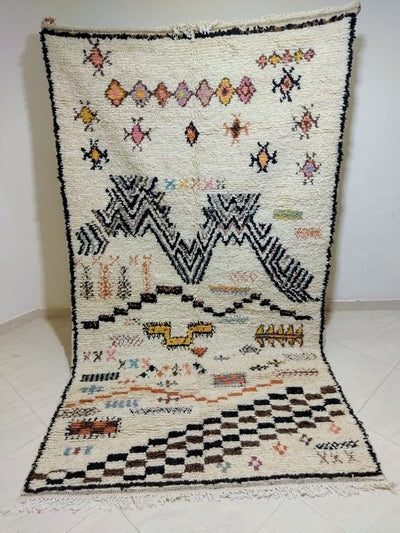 Artisanal Elegance: Handmade Moroccan Azilal Rug for Authentic Living Room Vibes